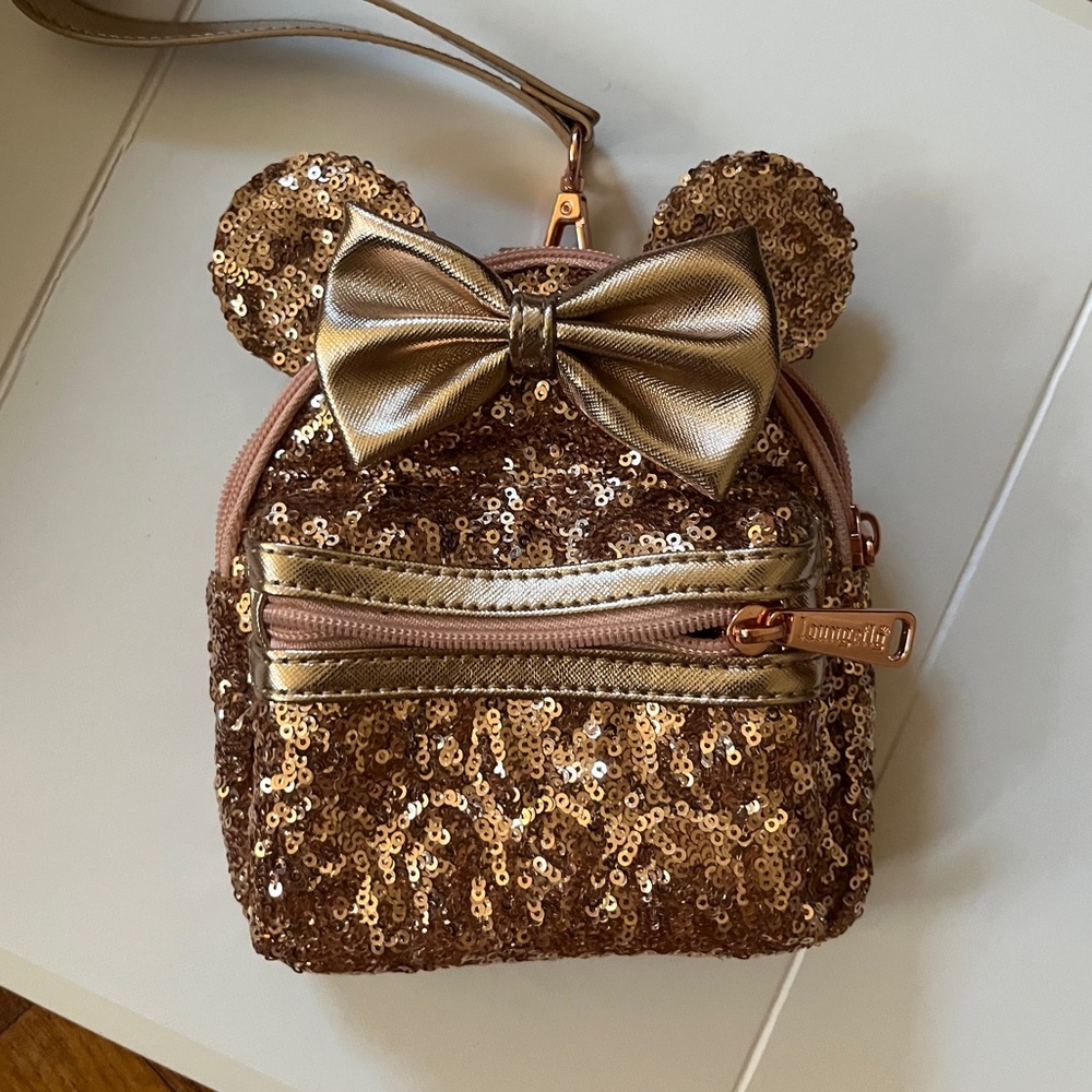 Rose gold sequin disneyland wristlet